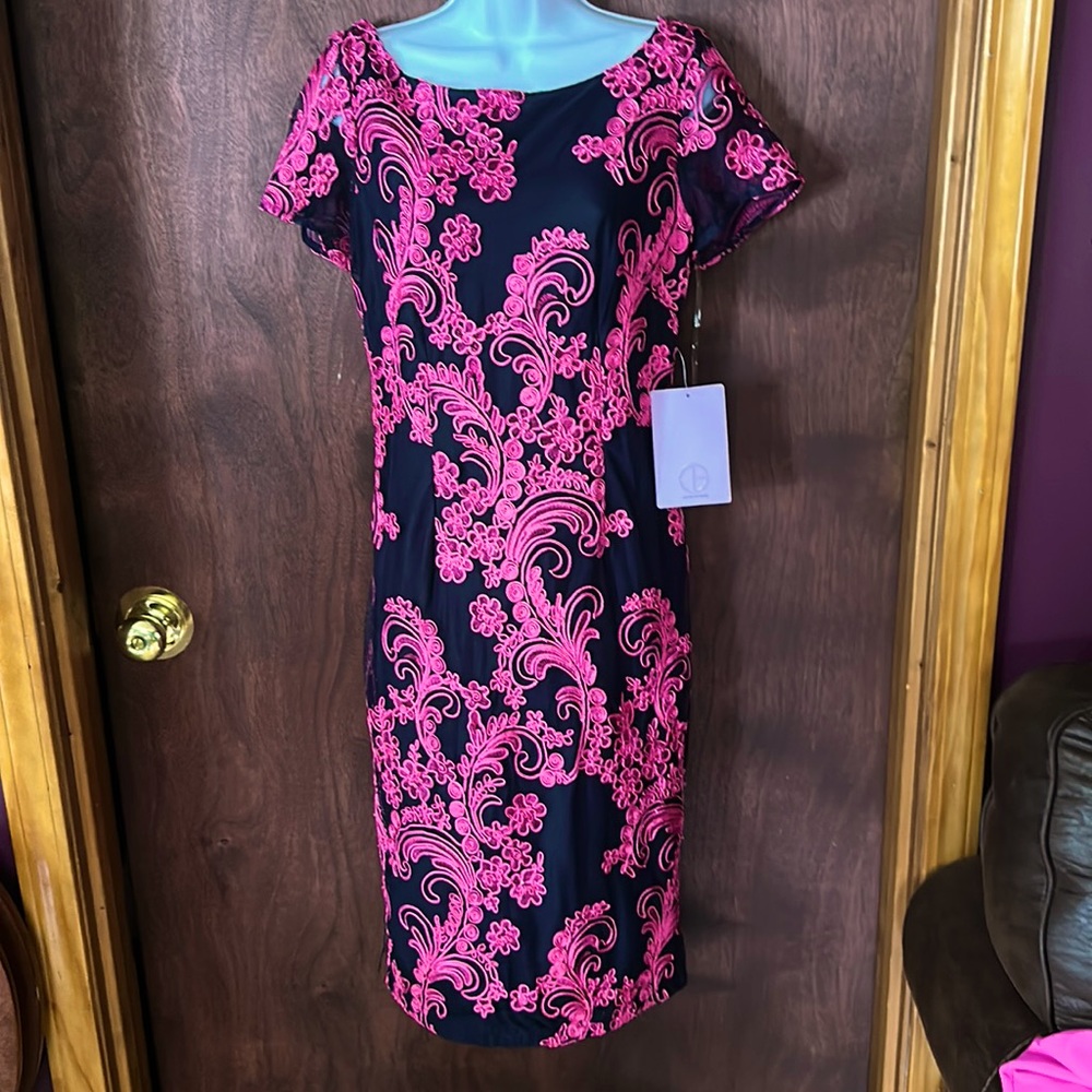 JS collection dress size 8. Black and pink sheer sleeves. Beautiful dress.